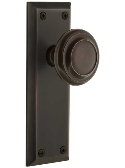 Grandeur Fifth-Avenue Door Set with Circulaire Knobs in Timeless Bronze.